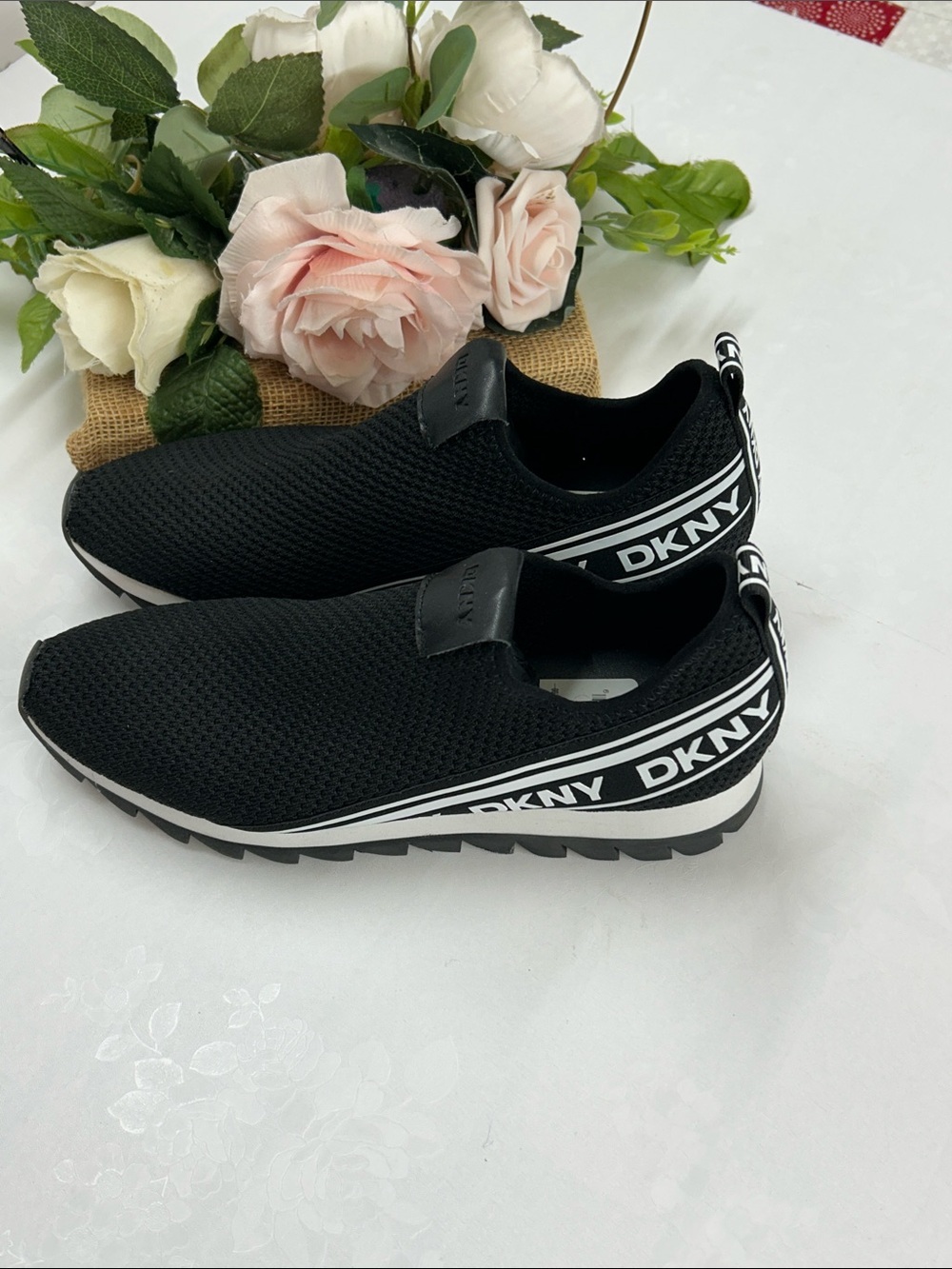 DKNY Black Knit Slip-On Sneakers with White Accents